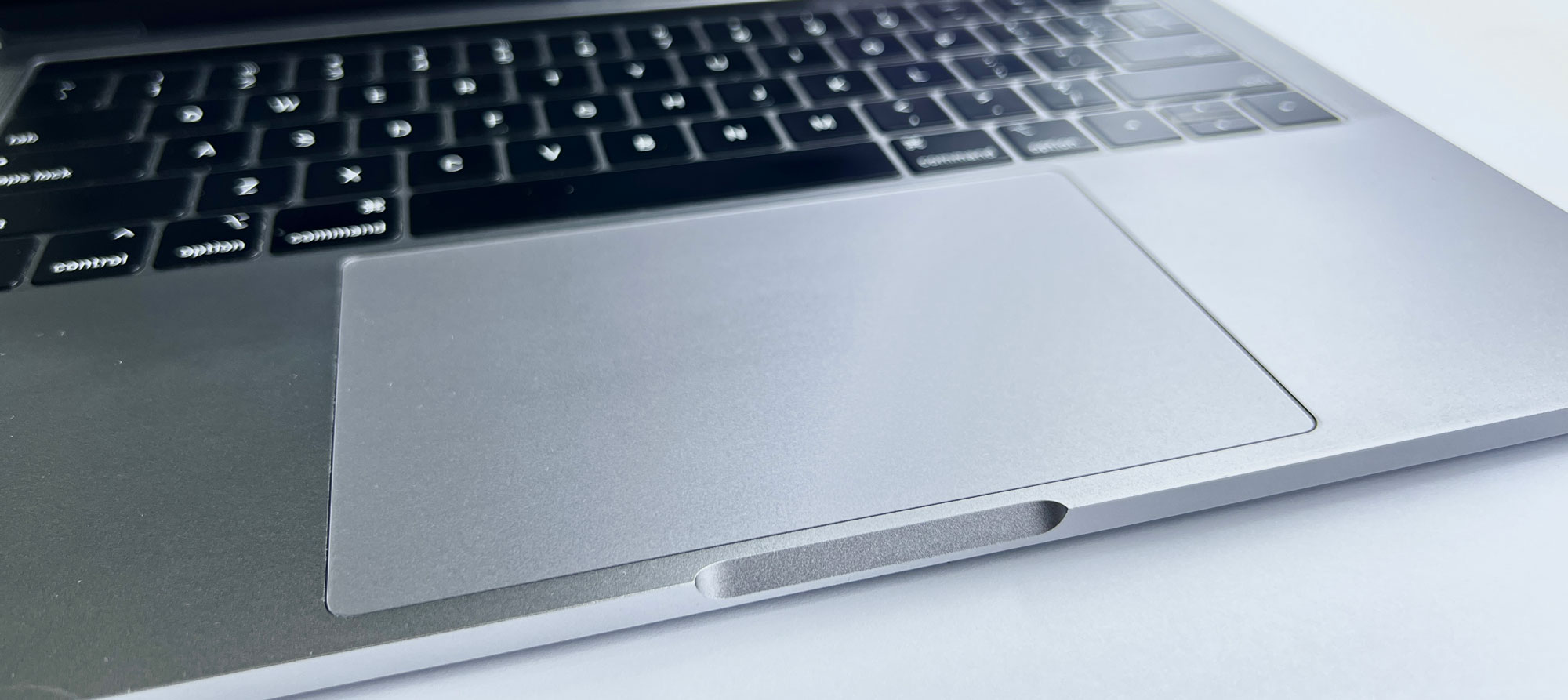 how to clean your macbook trackpad